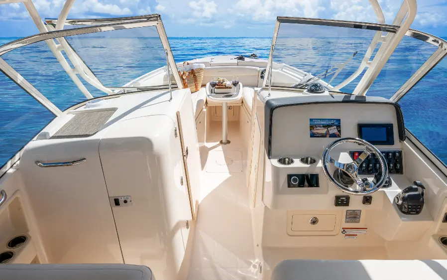 a boat with a steering wheel and dashboard sailing in the vast ocean boat rental florida keys gallery boat image