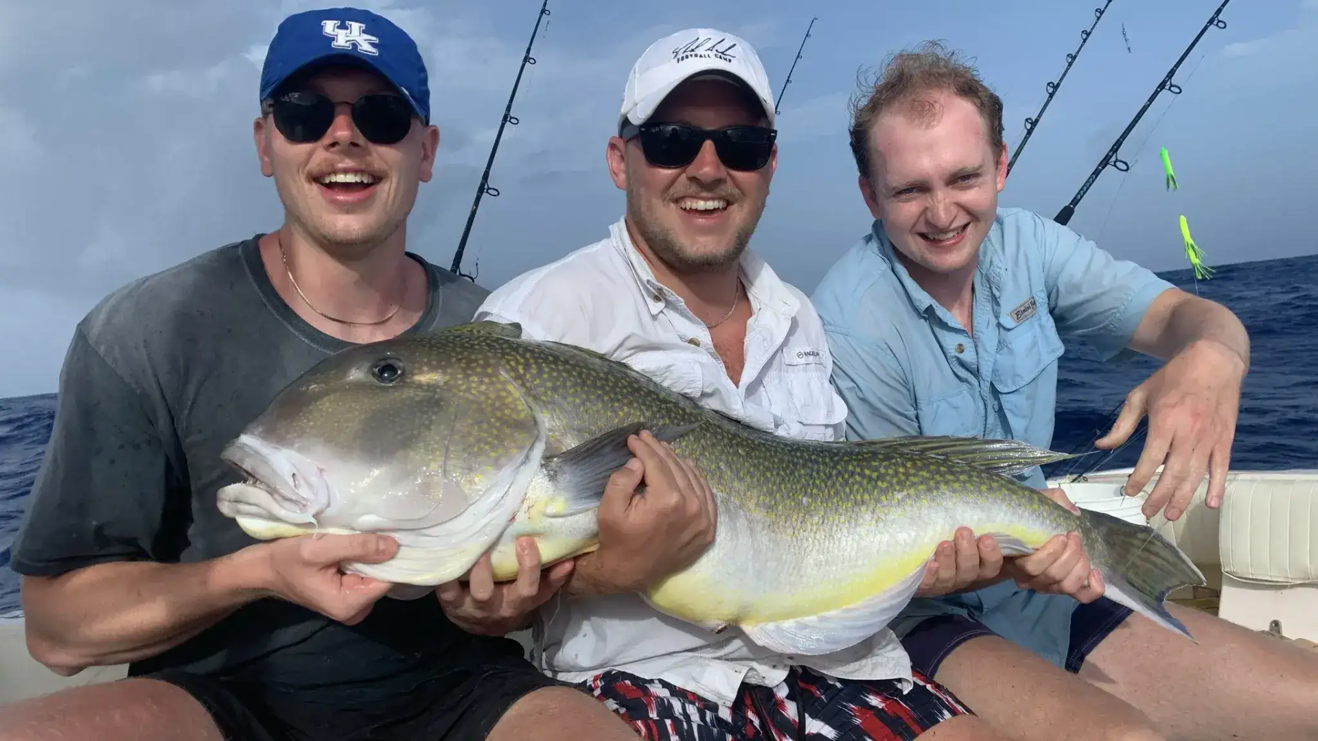 Anglers showing trophy grouper catch on a Florida Keys fishing charter